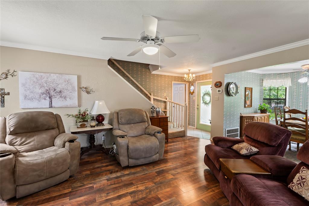 455 Stirrup Ranch Road Trinidad, TX 75163 - Photo 11 of 20 a living room with furniture and a chandelier