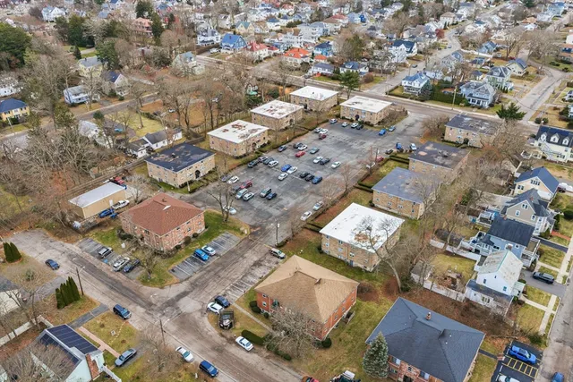 an aerial view of a city with lots of residential buildings