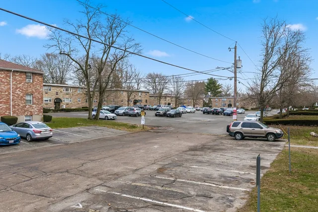 a view of a street with cars