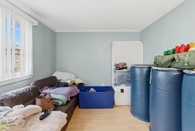 a room with furniture and a window