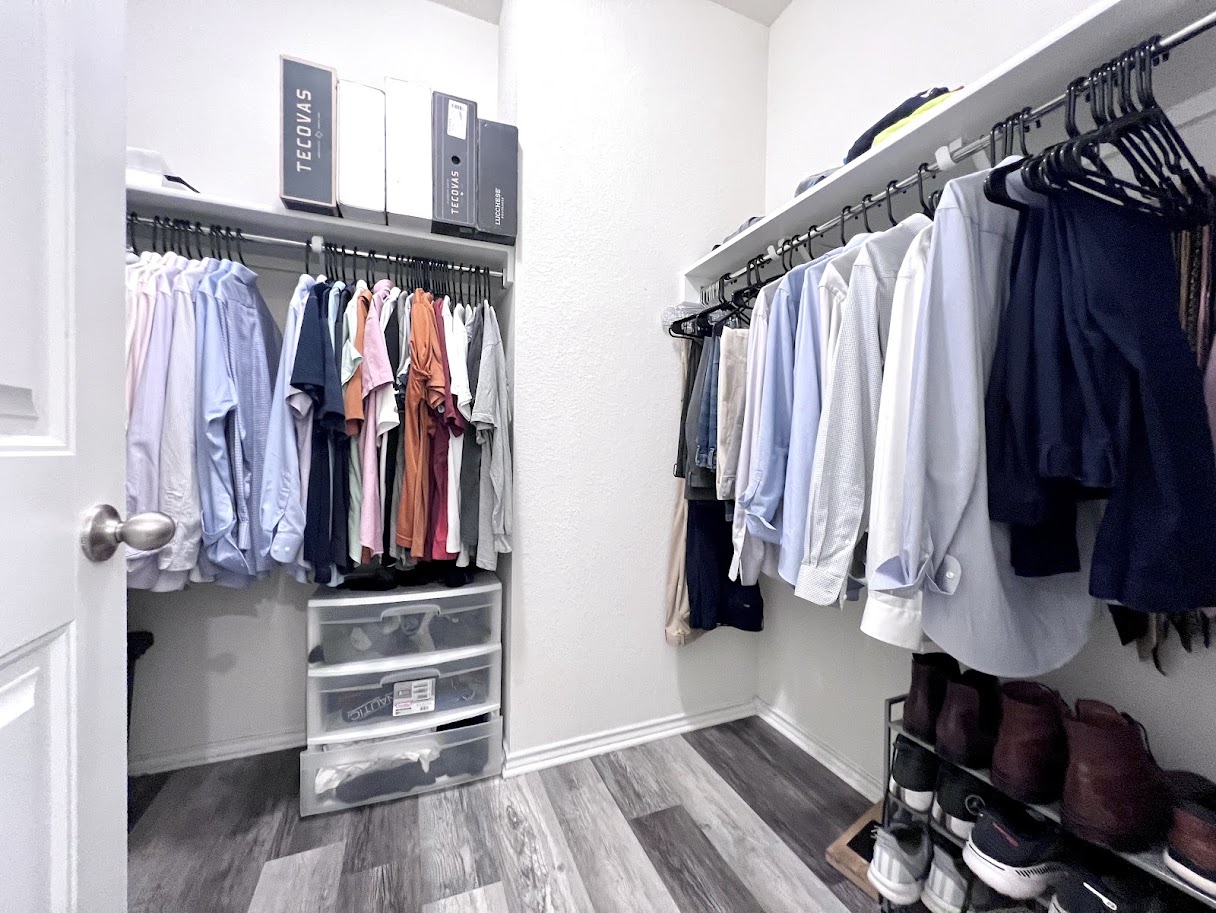 7900 Crystalbrook West Austin, TX 78724 - Photo 25 of 27 a view of walk in closet with clothes and shoes
