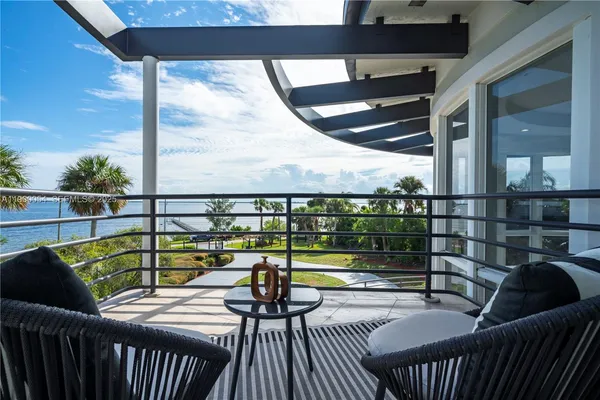 a dinning table and chairs in a patio