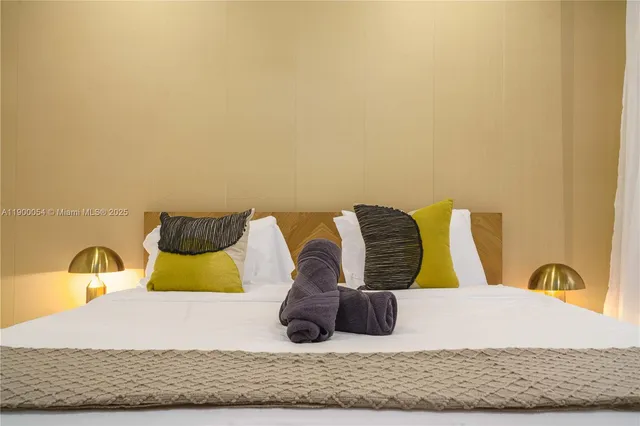 an aerial view of a house with swimming pool and outdoor space