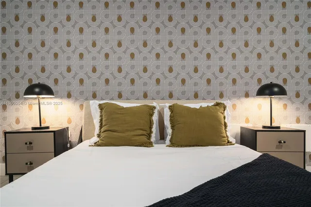 a row of palm trees sitting in front of a house