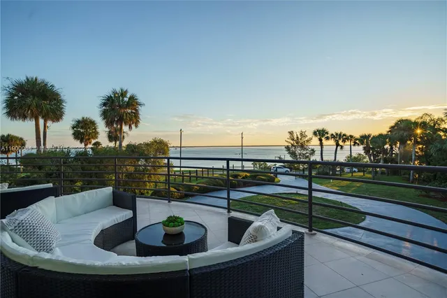a view of a swimming pool with lounge chair