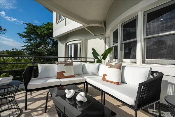 a view of a swimming pool with lounge chair