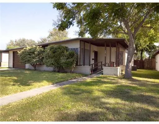 a view of a house with swimming pool