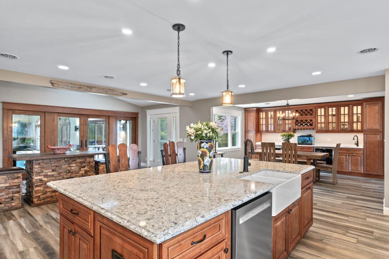 46 Casco Road Brunswick, ME 04011 - Photo 17 of 51 Kitchen into Dining and Pool