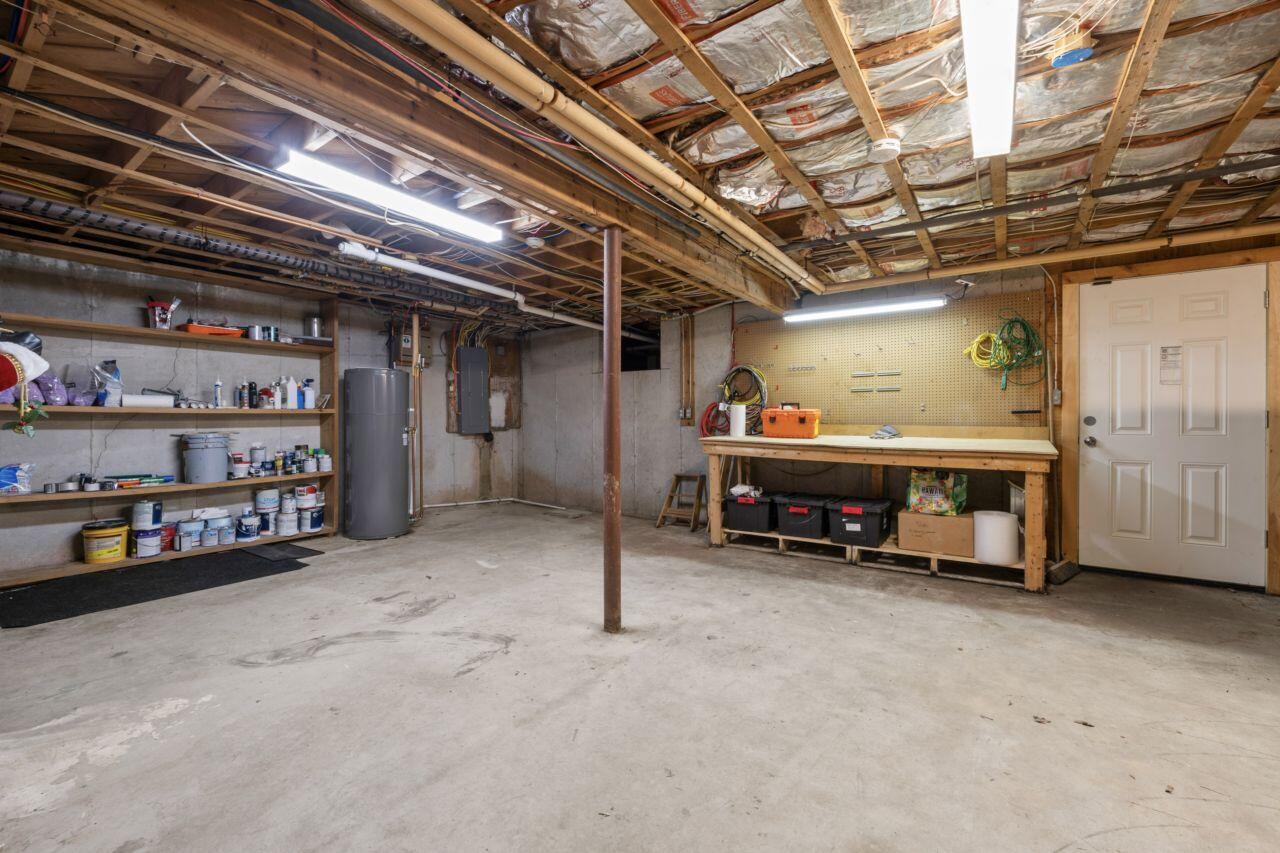 46 Casco Road Brunswick, ME 04011 - Photo 45 of 51 Basement Storage and Bench