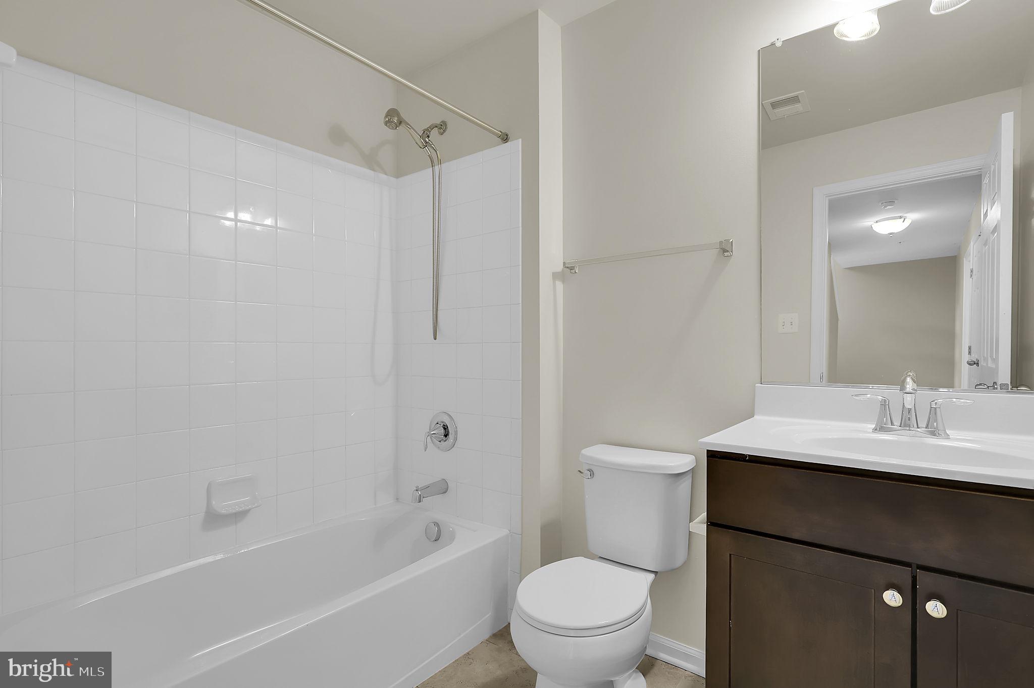 5906 Krantz Drive Frederick, MD 21703 - Photo 13 of 40 a bathroom with a sink a toilet and shower