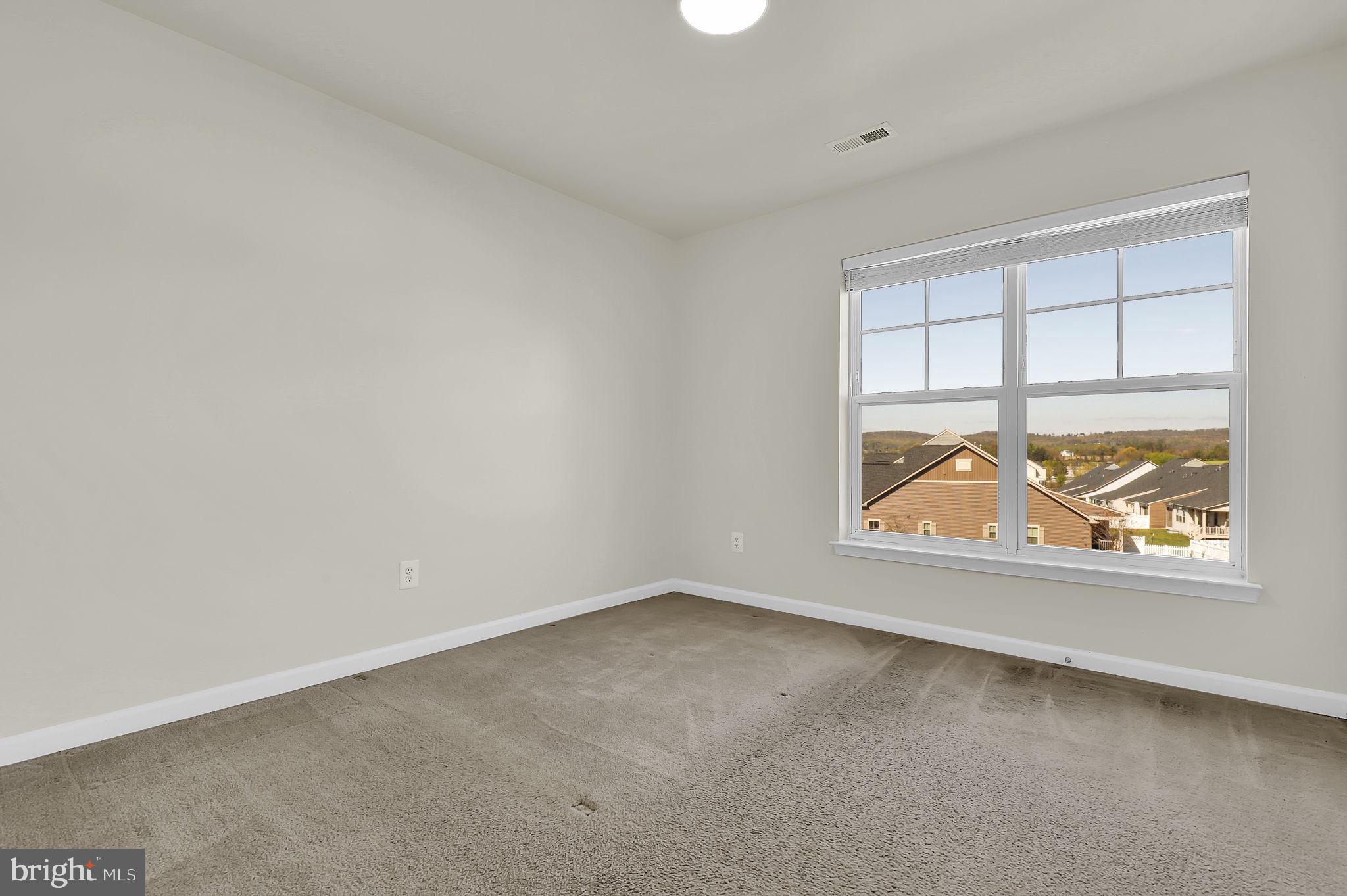 5906 Krantz Drive Frederick, MD 21703 - Photo 14 of 40 an empty room with a window