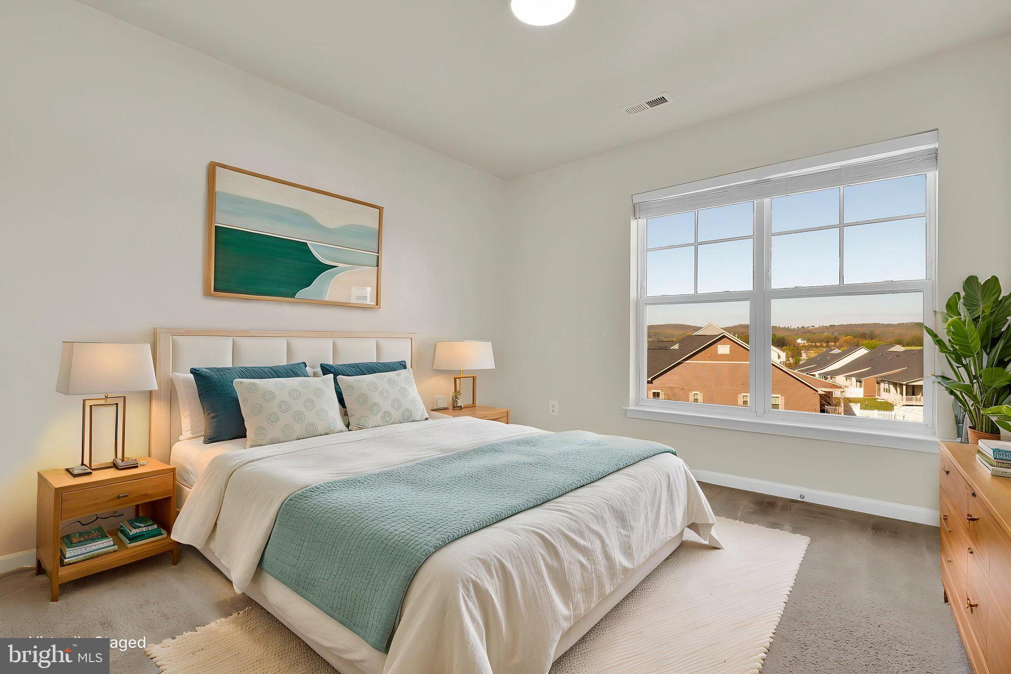 5906 Krantz Drive Frederick, MD 21703 - Photo 15 of 40 a bedroom with a bed and a window