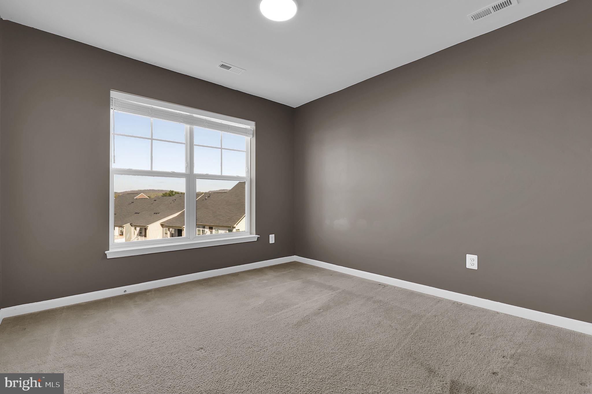 5906 Krantz Drive Frederick, MD 21703 - Photo 17 of 40 an empty room with a window