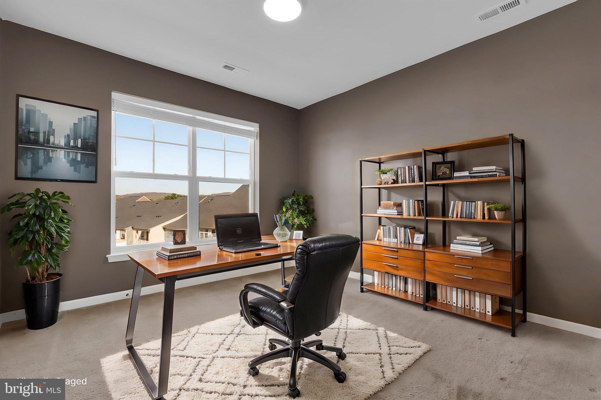 5906 Krantz Drive Frederick, MD 21703 - Photo 18 of 40 a view of a workspace with furniture and a window