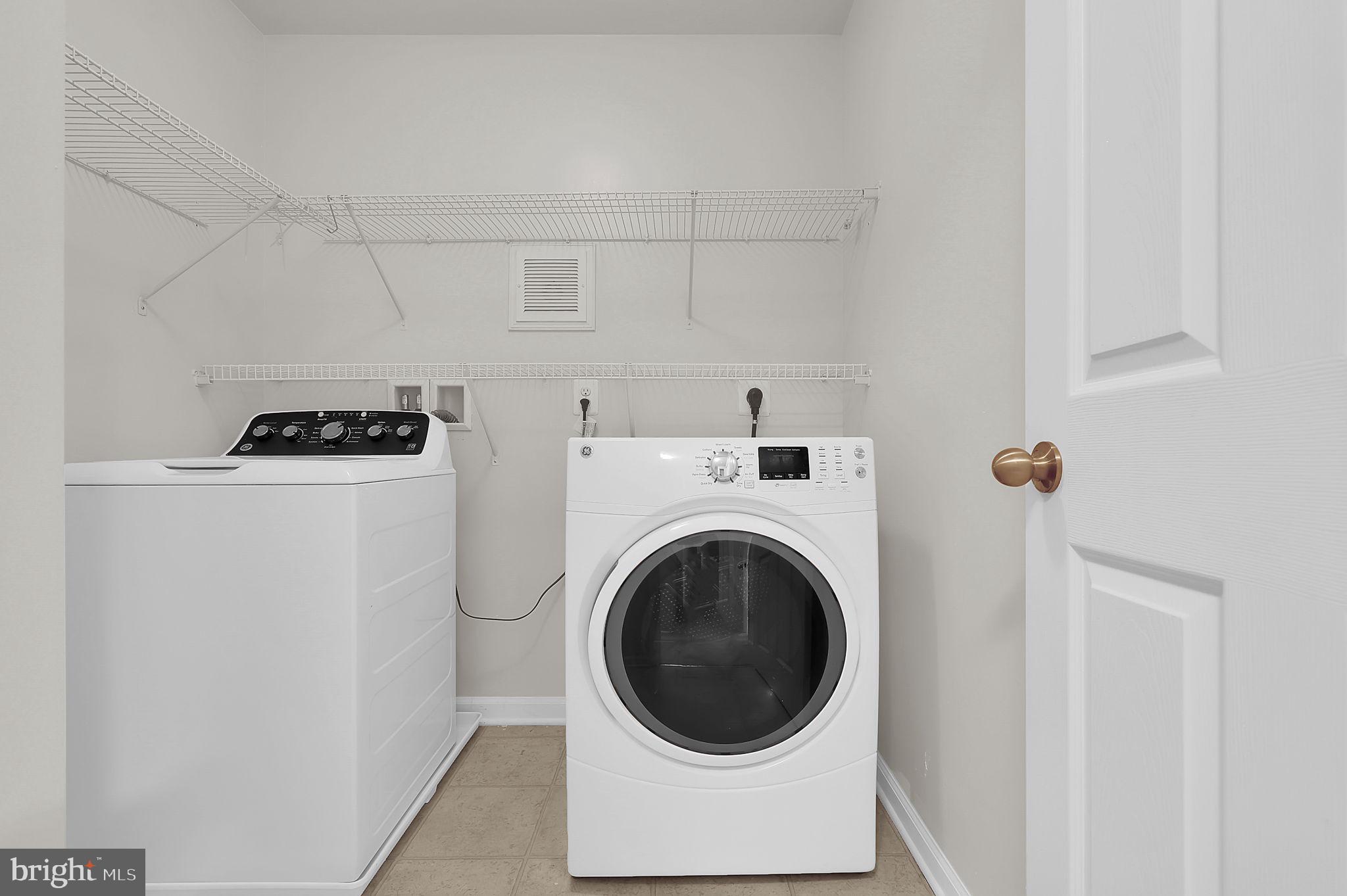 5906 Krantz Drive Frederick, MD 21703 - Photo 19 of 40 a utility room with dryer and washer