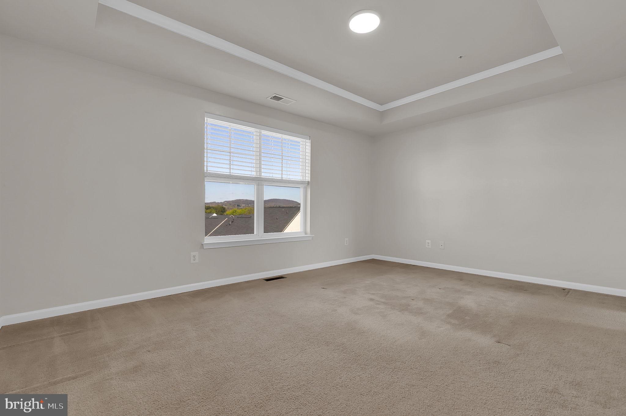 5906 Krantz Drive Frederick, MD 21703 - Photo 20 of 40 an empty room with windows