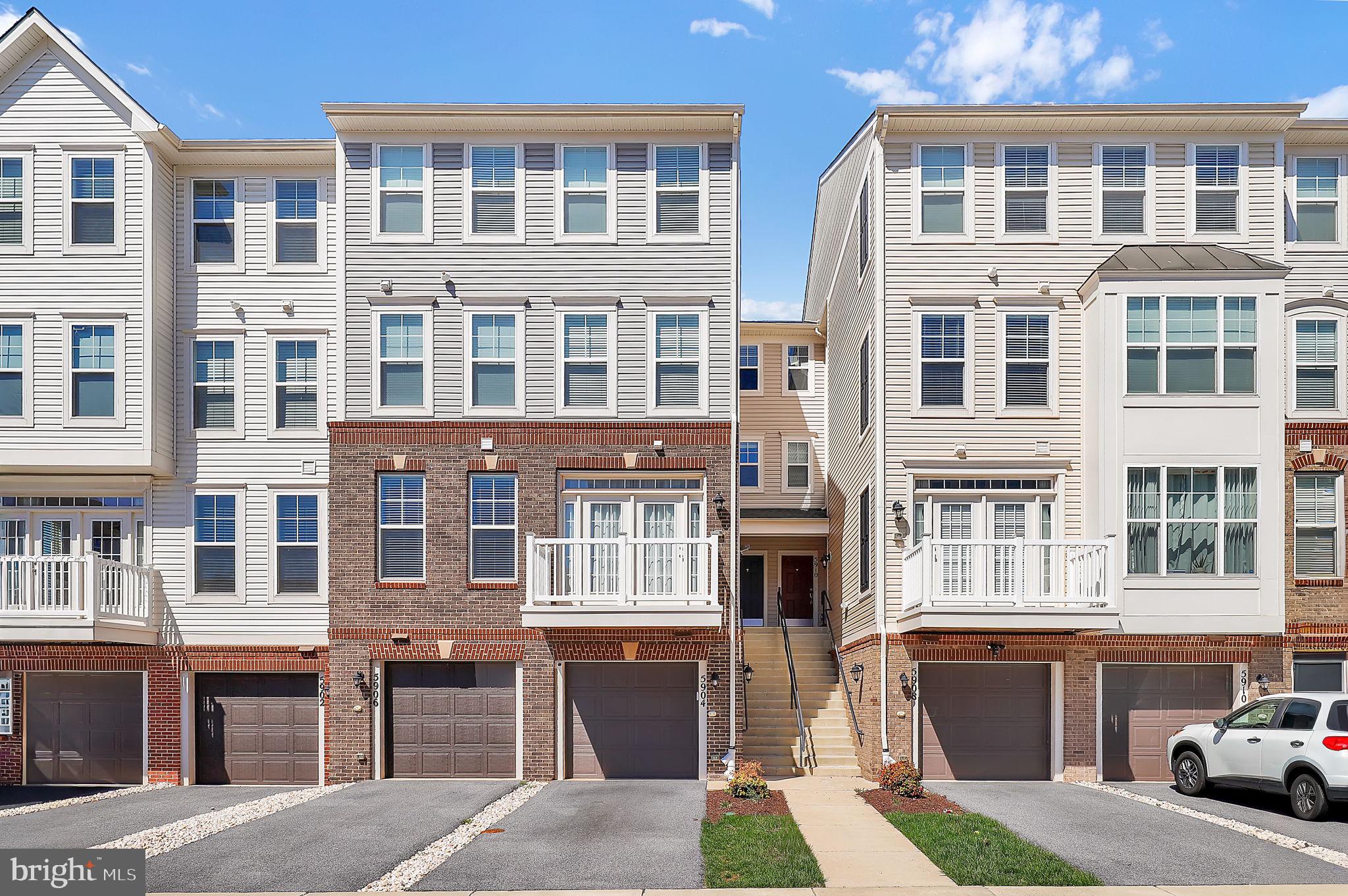 5906 Krantz Drive Frederick, MD 21703 - Photo 2 of 40 a front view of a building with a lot of windows