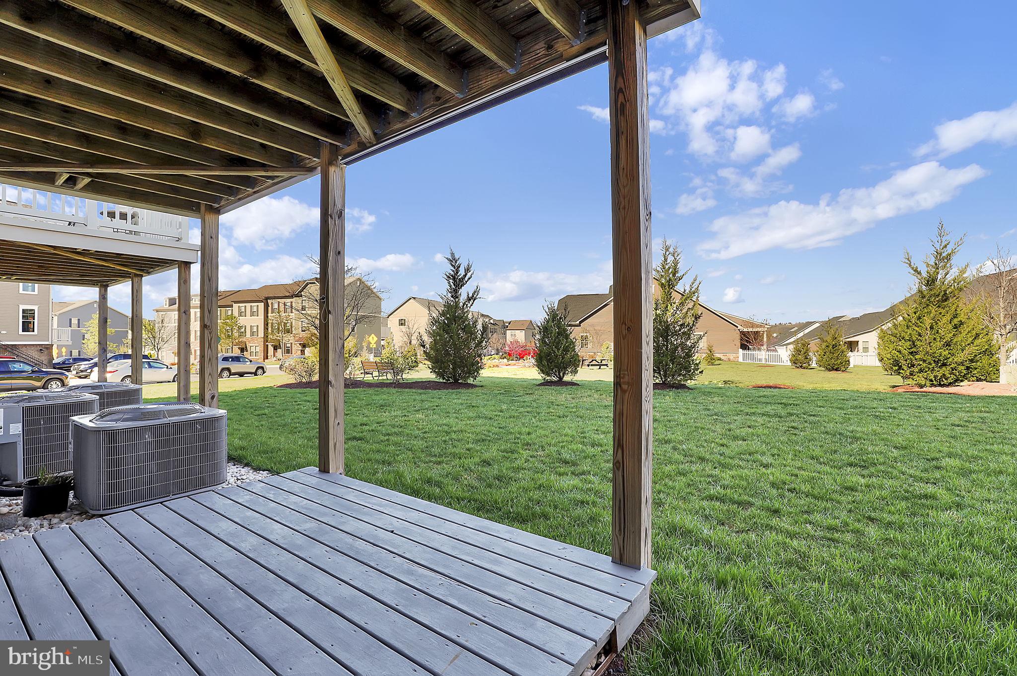 5906 Krantz Drive Frederick, MD 21703 - Photo 35 of 40 a view of a porch with furniture and garden