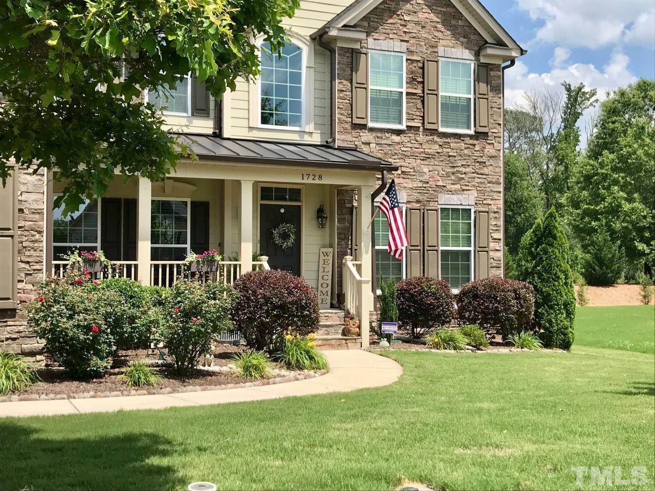 1728 Colleen Circle Cary, NC 27519 - Photo 1 of 37 front view of a house with a yard