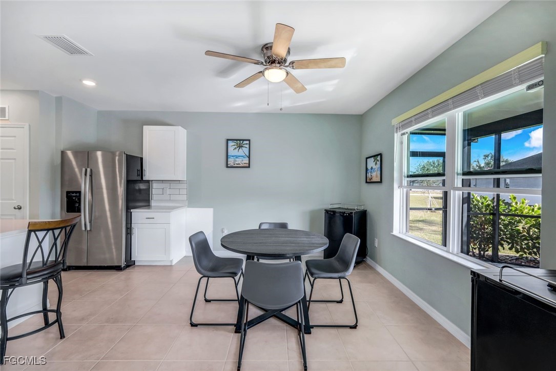 566 Corrientes Circle Punta Gorda, FL 33983 - Photo 17 of 36 a dining room with furniture and window