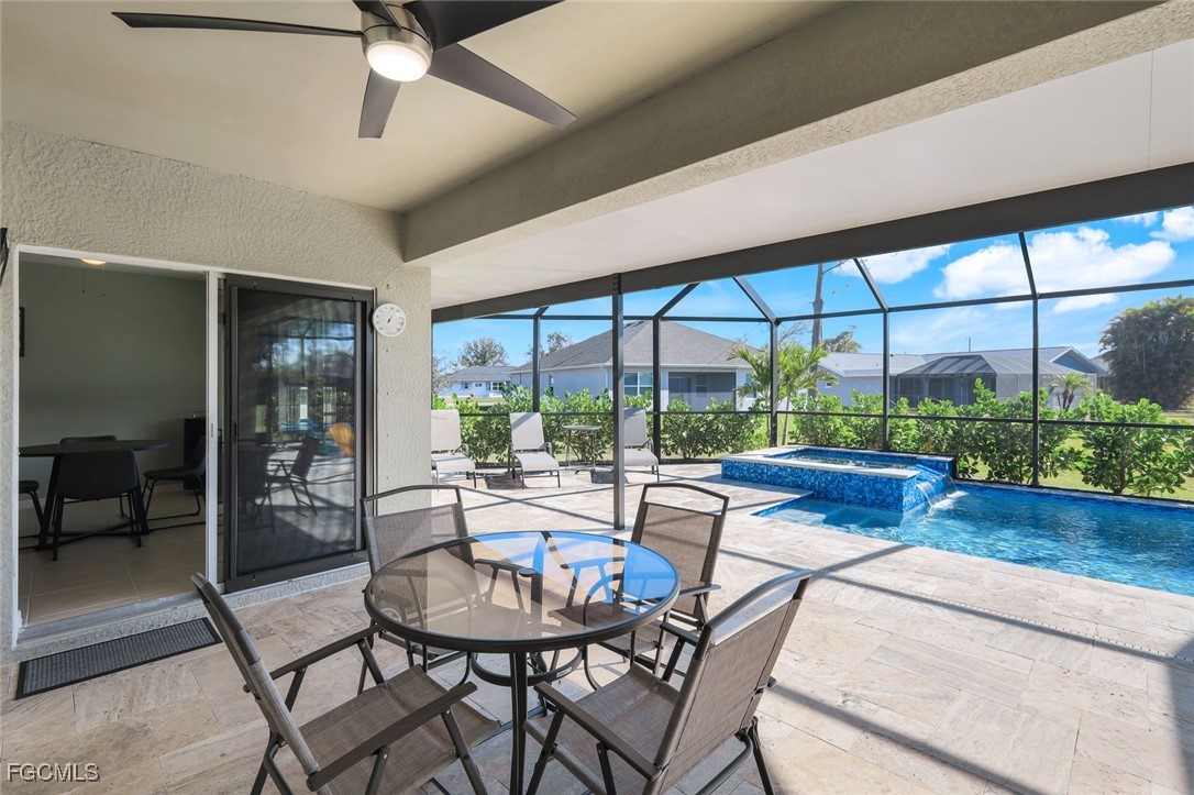 566 Corrientes Circle Punta Gorda, FL 33983 - Photo 28 of 36 a living room with furniture and a large window