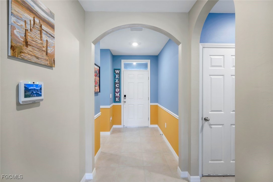566 Corrientes Circle Punta Gorda, FL 33983 - Photo 8 of 36 a view of hallway with stairs