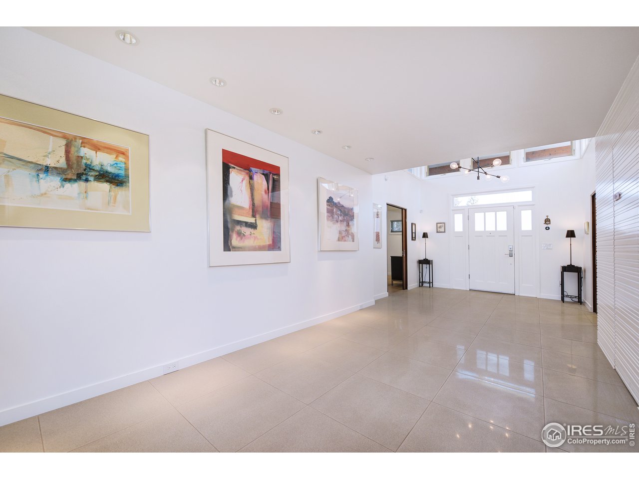 7006 Roaring Fork Trail Boulder, CO 80301 - Photo 11 of 40 a view of a big room with closet and windows