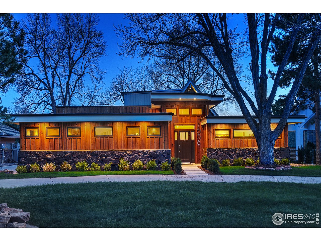 7006 Roaring Fork Trail Boulder, CO 80301 - Photo 2 of 40 a view of swimming pool is middle in the garden