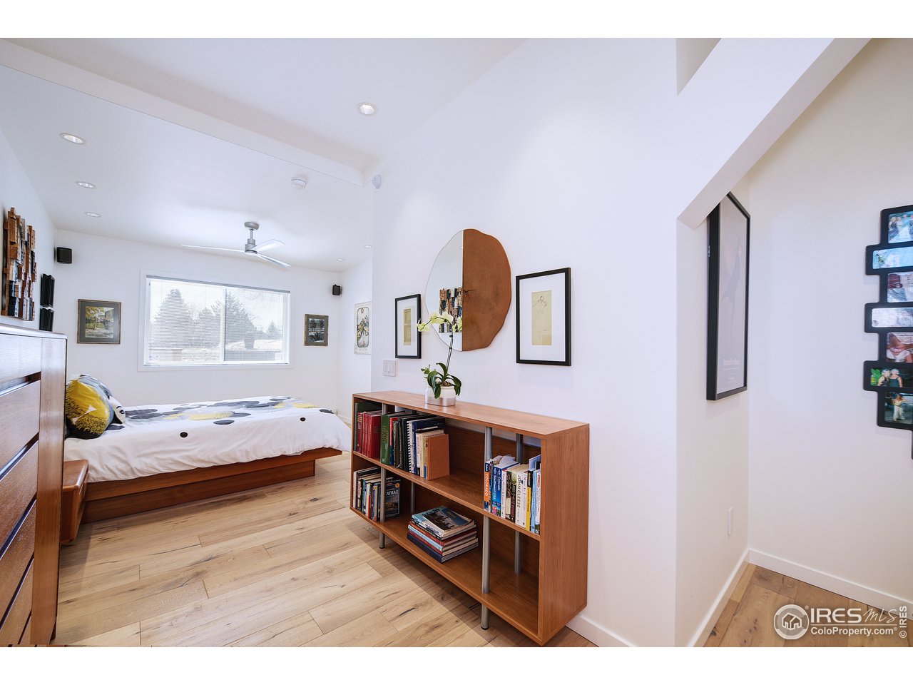 7006 Roaring Fork Trail Boulder, CO 80301 - Photo 39 of 40 a bedroom with furniture and window