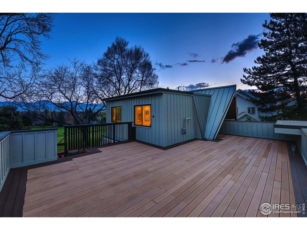 7006 Roaring Fork Trail Boulder, CO 80301 - Photo 7 of 40 a view of a backyard of a house