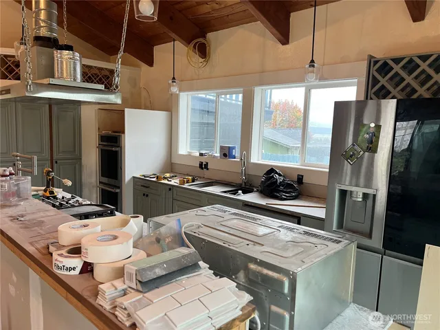 an aerial view of a house with a garden