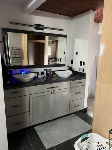 a room with furniture and stairs