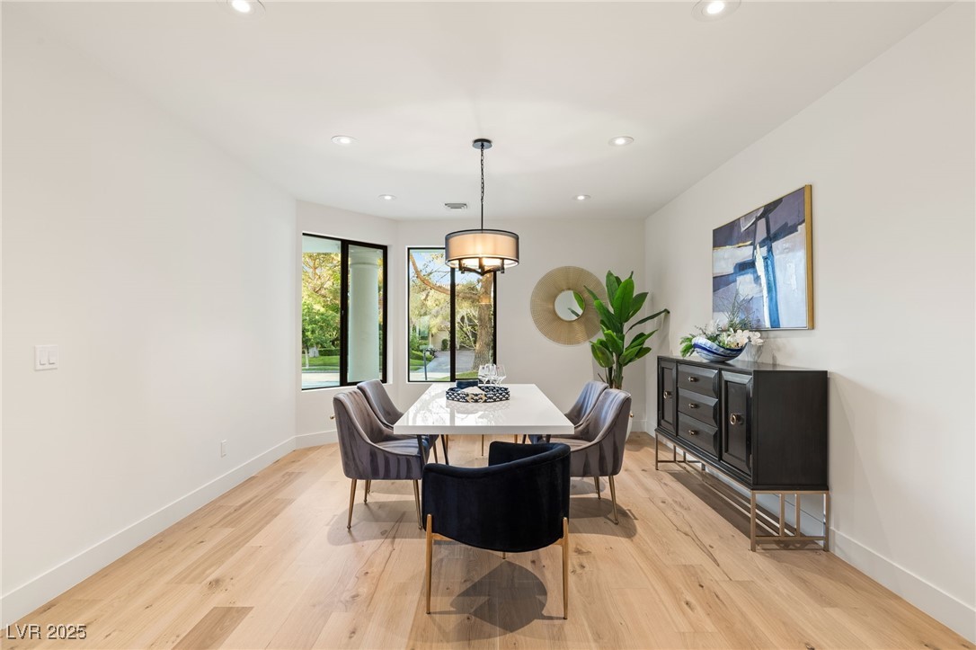 2316 Prometheus Court Henderson, NV 89074 - Photo 12 of 92 Dining area with recessed lighting, light wood-style flooring, and baseboards