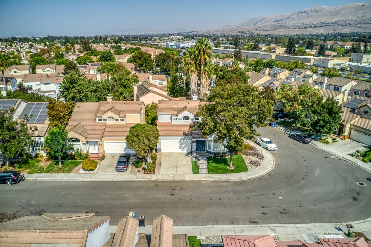 191 Seaside Drive Milpitas, CA 95035 - Photo 11 of 12 an aerial view of residential houses with outdoor space and parking