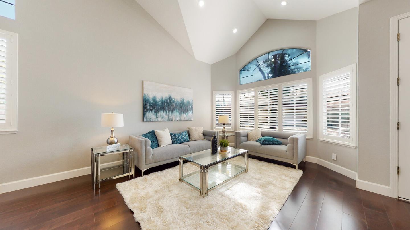 191 Seaside Drive Milpitas, CA 95035 - Photo 4 of 12 a living room with furniture and a large window