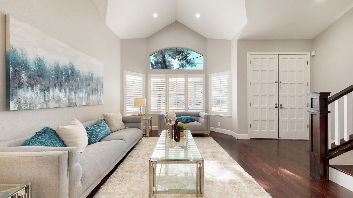 191 Seaside Drive Milpitas, CA 95035 - Photo 5 of 12 a living room with furniture and a large window