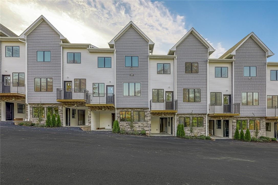 27 Ridge Avenue, Unit 205 Spring Valley, NY 10977 - Photo 1 of 1 a view of building with street