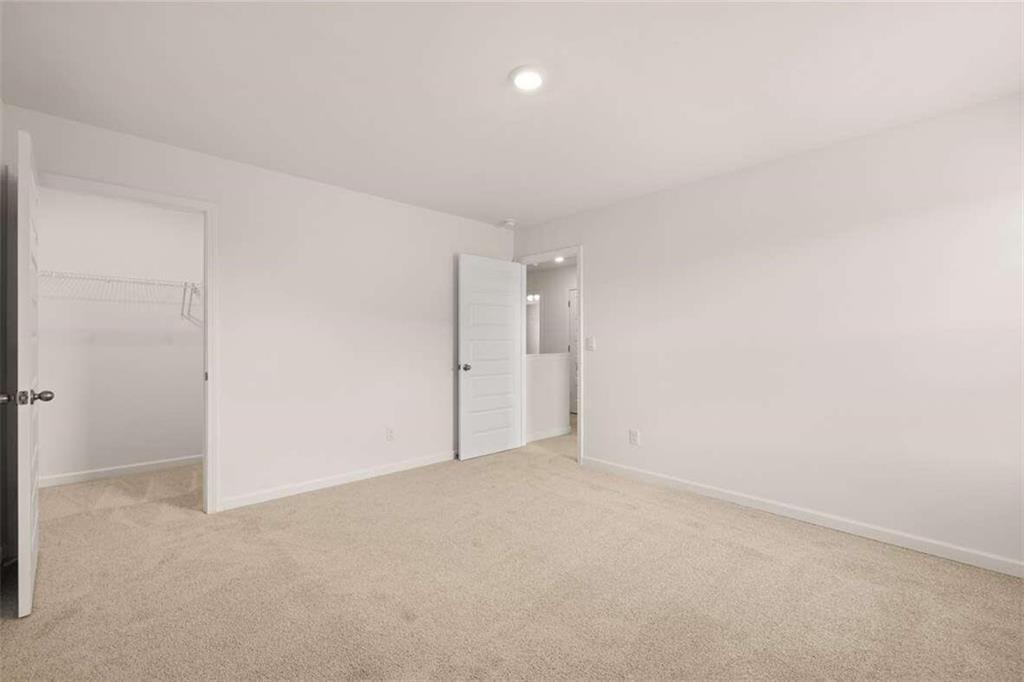 186 Aster Avenue Locust Grove, GA 30248 - Photo 38 of 46 a view of an empty room