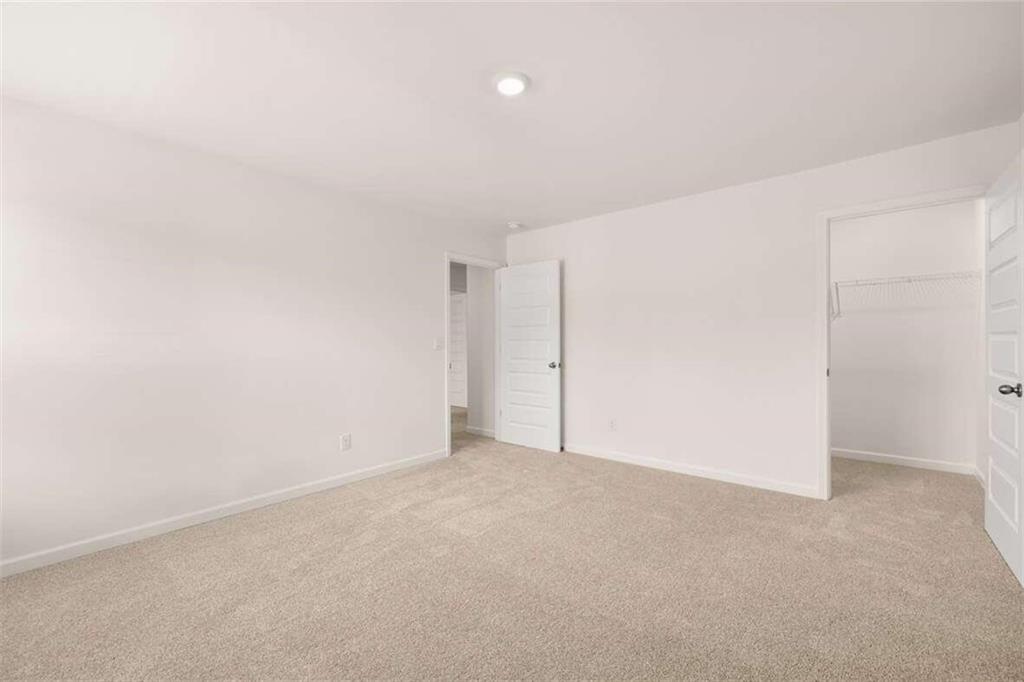 186 Aster Avenue Locust Grove, GA 30248 - Photo 41 of 46 a view of an empty room