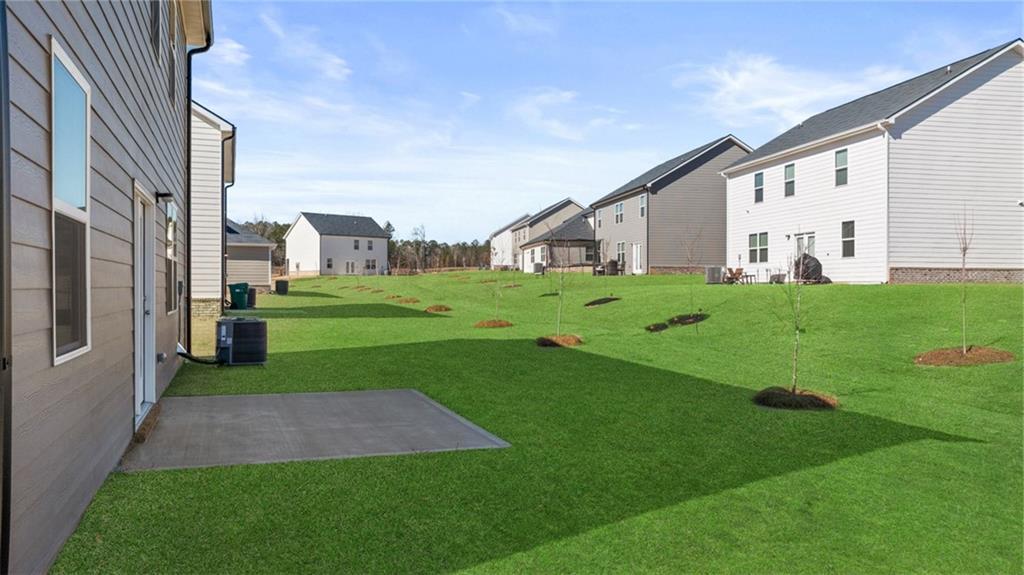 186 Aster Avenue Locust Grove, GA 30248 - Photo 45 of 46 a view of a house with backyard