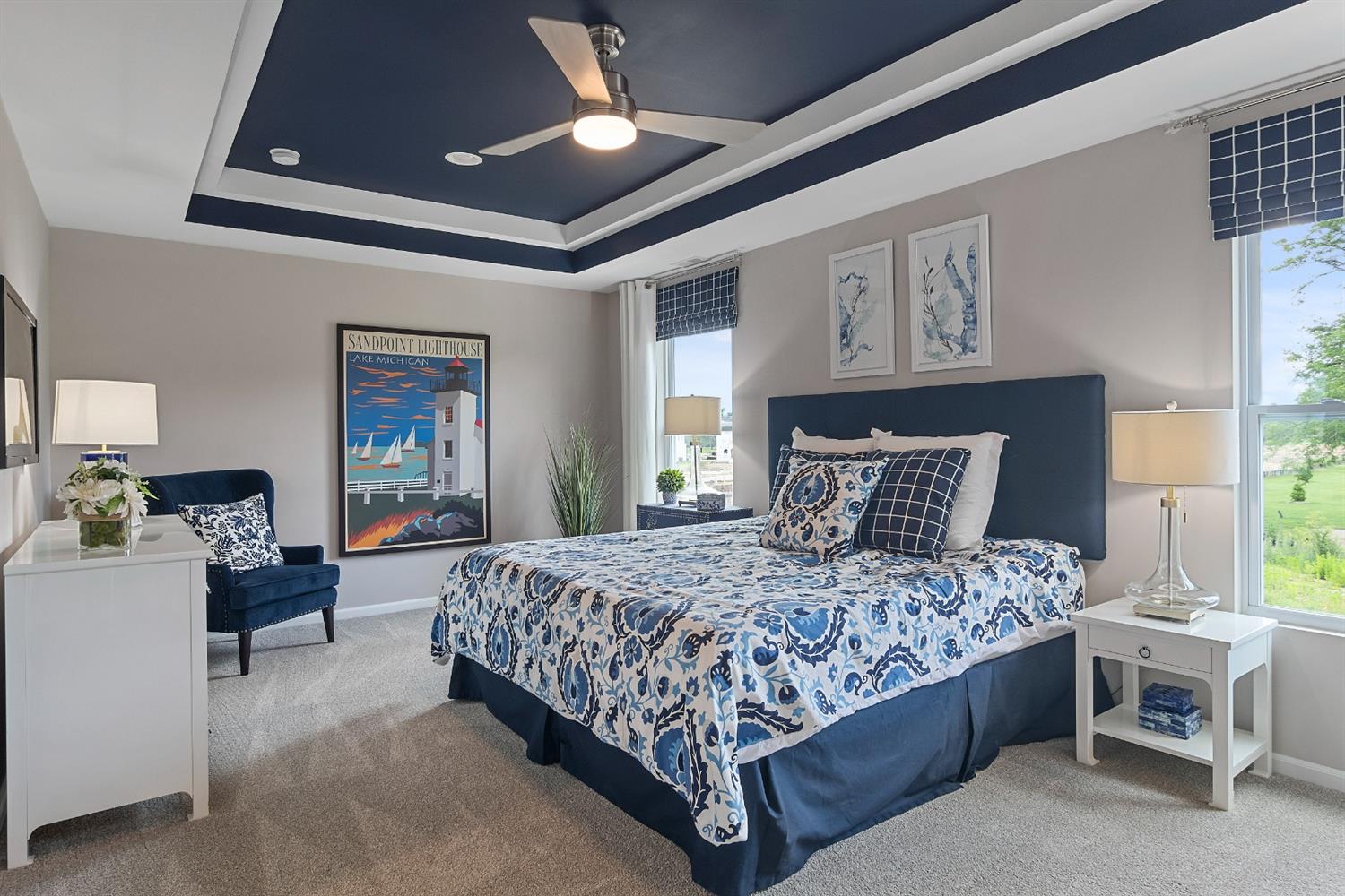 8681 Burr Rdg Circle Crown Point, IN 46307 - Photo 16 of 23 a bedroom with a large bed and a chandelier