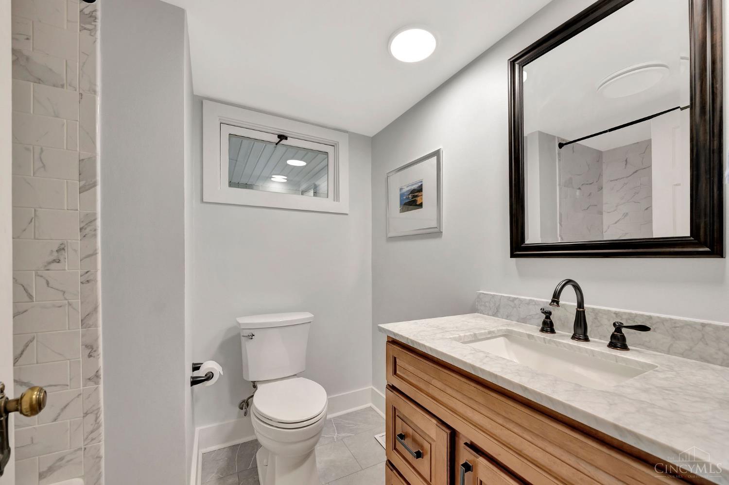 5115 Bonham Road Oxford, OH 45056 - Photo 11 of 24 Recently Remodeled Full Bath adjacent to first floor Bedroom.