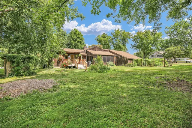 an aerial view of a house with garden