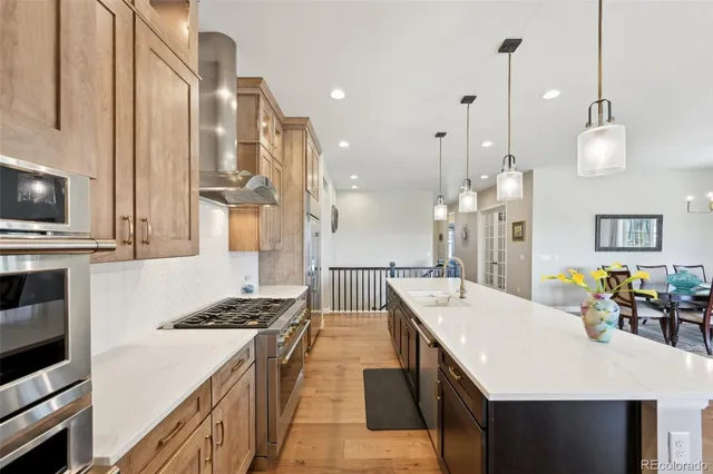 a bed sitting in a spacious bedroom next to a window