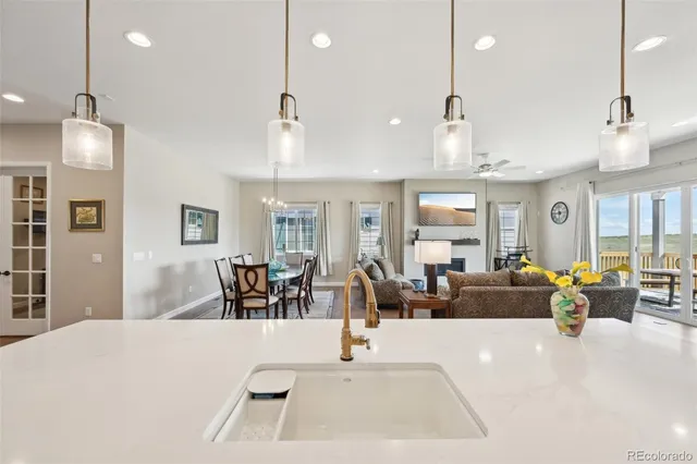 a bathroom with a sink toilet and a mirror