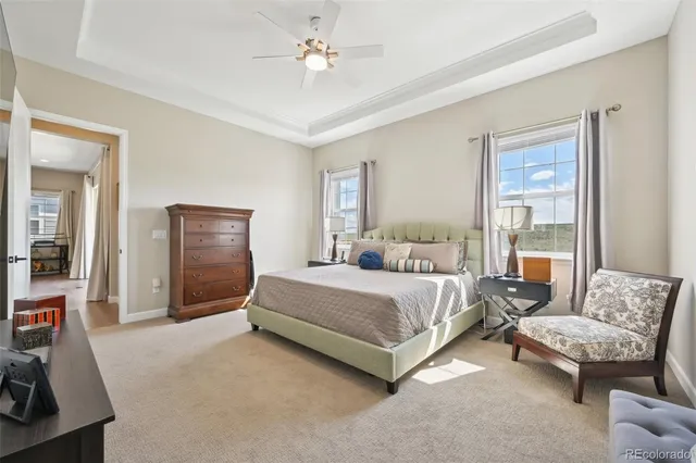 a view of a livingroom with furniture and a large window