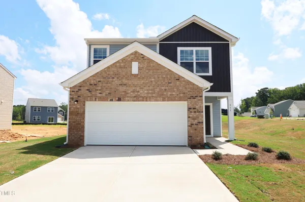 a front view of house with yard