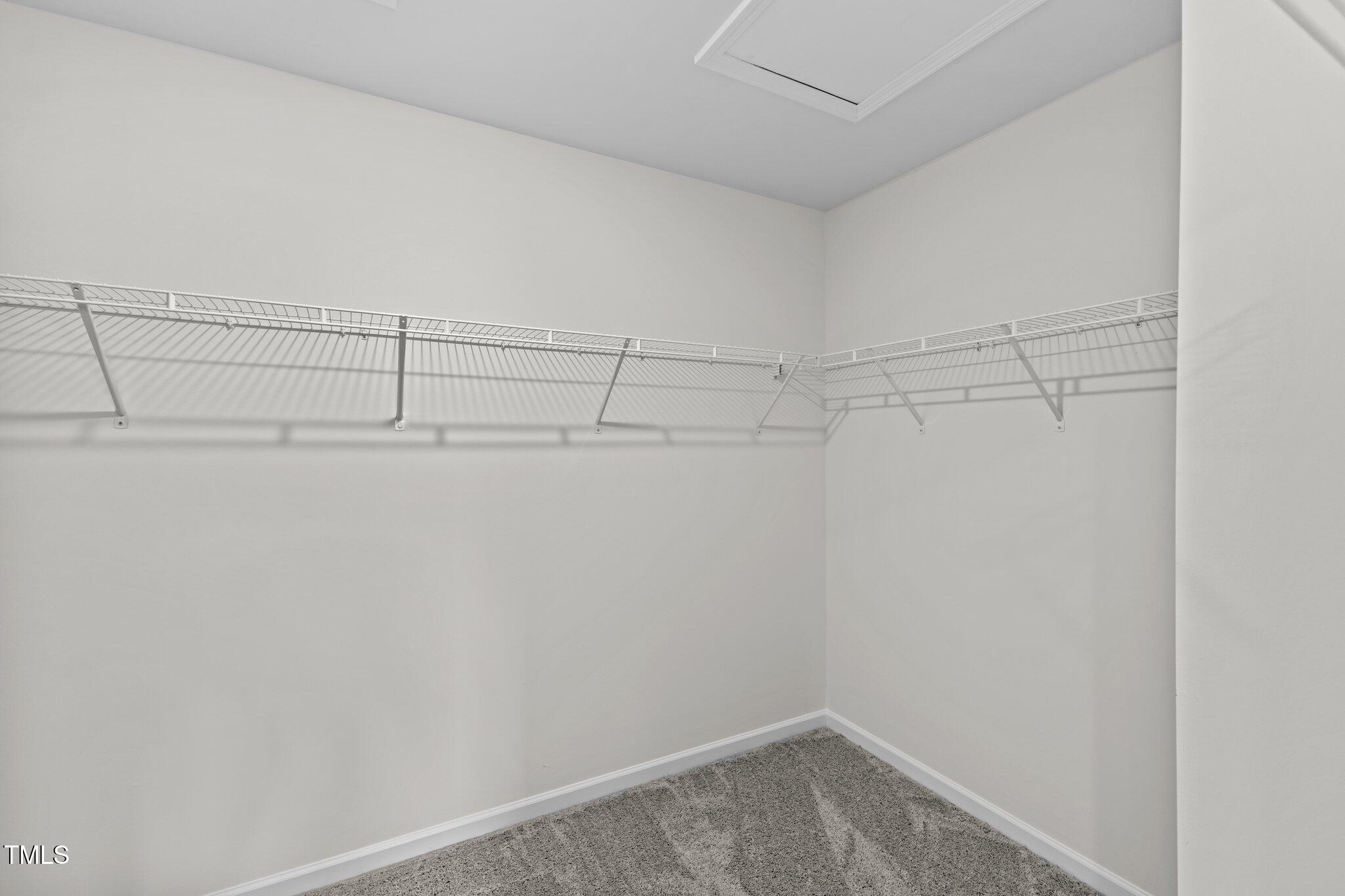 915 Dassault Ln Spring Spring Hope, NC 27882 - Photo 14 of 26 a view of a room with racks on the wall