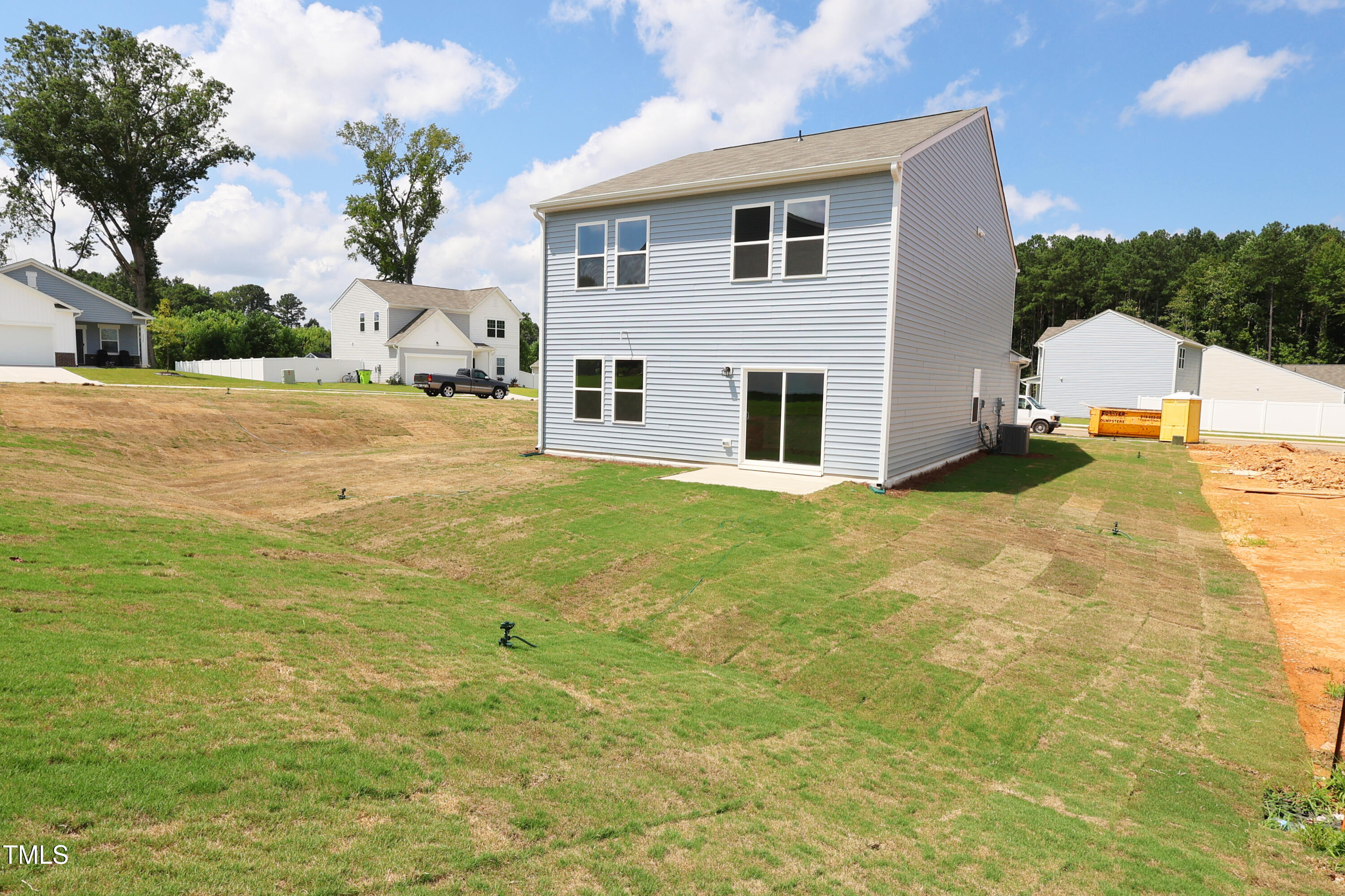 915 Dassault Ln Spring Spring Hope, NC 27882 - Photo 5 of 26 a view of a white house with a yard