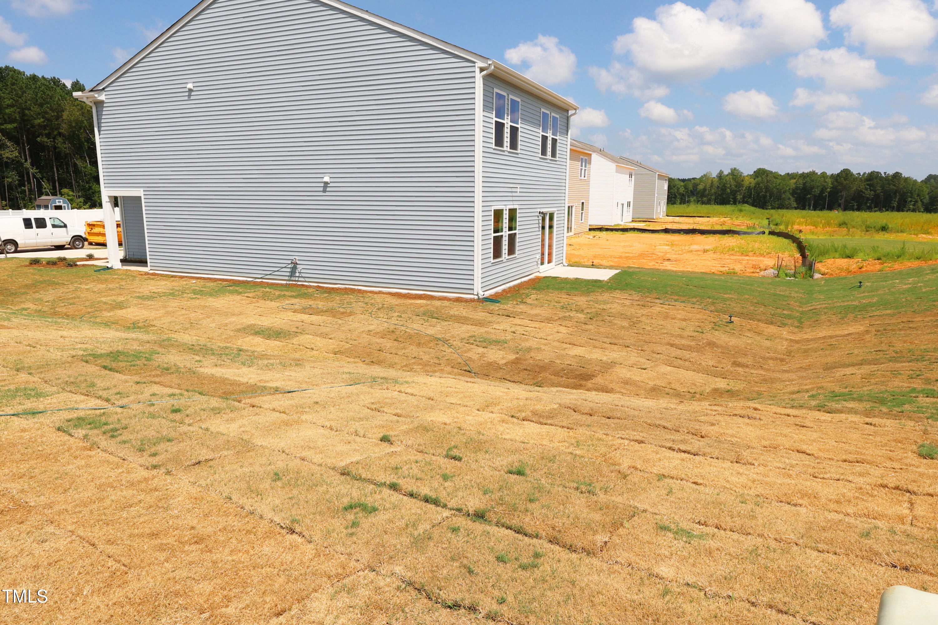 915 Dassault Ln Spring Spring Hope, NC 27882 - Photo 6 of 26 a view of a patio yard and swimming pool